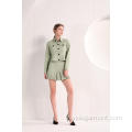 Veste femme vert olive et mini jupe plissée